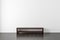 Dark wooden Tv console bureau Mockup near white wall in empty living room