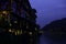 Darkness engulfs the waterfront town of Fenghuang Ancient City in Tibet, China