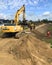 Darlowo, Poland, June 12 2021: Building anti flood sand barrier on the Wieprza river