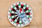 Dart arrow hitting in bullseye on dartboard