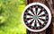 Dartboard closeup with blur bokeh background for objective business target, dart board sport and business concept