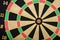 Dartboard closeup view showing target success concept