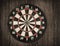 Dartboard on old wooden wall.