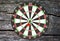 Dartboard on wood wall