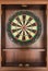 Darts board on wooden cabinet interior home and living decoration collection retro style contemporary