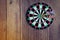 Darts embroidered on dartboard, dust the game focuses on success