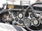 Dashboard and steering wheel in interior of british classic sport car isolated on white background