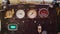 Dashboard of tug with indicators of oil and water temperature of old soviet tank engine.. Writing in Russian watter and