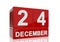 The date of 24 December in white numbers and letters on red, glossy blocks