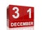 The date of 31 December in white numbers and letters on red, glossy blocks
