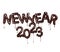 Date of the New Year 2023 made of melted dark chocolate isolated on a white background