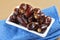 Dates in plate. Dried dates fruits