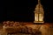 Dates in wooden bowl and lantern on wooden table. Muslim holy month Ramadan Kareem. Copy space