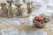 Dates and zam zam water cups on white table cloth