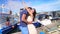 Dating couple embrace on ship pier. Summer date. Romantic journey