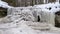 Dauda waterfall in winter. Small Frozen waterfall in Gauja national park Latvia