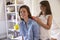 Daughter Brushes Mother`s Hair As They Sit In Girl`s Bedroom