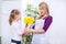 Daughter donates mother a bouquet of flowers for mother\'s day