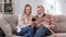 Daughter granddaughter teaching to elderly father grandfather smartphone chatting application