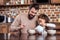 daughter pouring milk to father plate