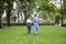 Daughter takes care of father and helps Support, Encourage him during his illness at hospital garden. The happiness of old adult