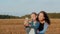 Daughter teenager making selfie photo together mother on rural fields