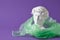 david head in transparent plastic bag on purple background, art decline, environmental pollution slices concept