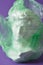 david head in transparent plastic bag on purple background, art decline, environmental pollution slices concept