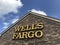 Davie, Florida, USA - Feb 2,2020: A Wells Fargo Bank sign at a Wells Fargo Facade nice sky in the background.