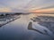 Dawn aerial seascape view of Olhao Marina, waterfront to Ria Formosa natural park.