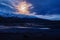 Dawn dusk over Lake Dzhangyskol in the tract Yeshtykol and the North Chuysky ridge in the moonlight