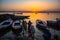 Dawn on the Ganges river, with the silhouettes of boats with pilgrims.