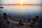 Dawn on Ganges river, with silhouettes of boats with pilgrims.