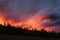 Dawn mountains sky fiery clouds