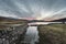 Dawn over Loch Assynt in the Scottish Highlands.