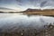 Dawn over Loch Assynt in the Scottish Highlands.