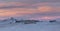 Dawn over the observatory with a mirror telescope in the mountains of the central Caucasus in winter.