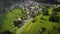 Dawn quiet village europe mountains life forest mountains dolomites aerial cinematic footage