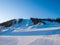 Dawn in the ski resort Mountain Salanga. Snowy slopes