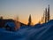 Dawn in the ski resort Mountain Salanga. The sun appears over the horizon