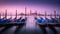 Dawn in Venice with gondolas and mooring posts