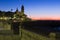 Dawn view of church at embankment. Sitges