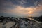 Dawn view of sand beach with rocks