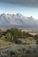 Dawn and a weather front over the Grand Tetons from Spring Creek Ranch Jackson Wyoming.