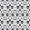 Day of the dead seamless pattern with skulls and flowers on white background. Traditional mexican Halloween design for