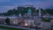 Day to Night time lapse video of Salzburg old town with Hohensalzburg Fortress in Austria timelapse 4K