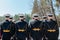 The day of victory in Russia. Russian navy troops in black full dress uniform. Back view.