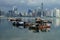 Day view of Panama City Over Panama Bay with skyline and fishing boats on the foreground