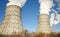 Day view of power plant, smoke from the chimney