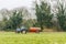 Day view tractor fertilizer sprays on British field